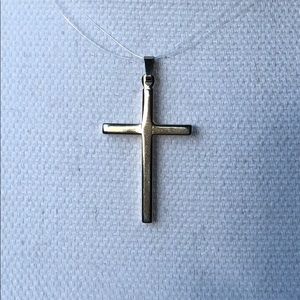 Silver tone cross pendant